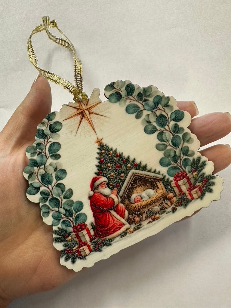 Santa At The Manger Christmas Ornament